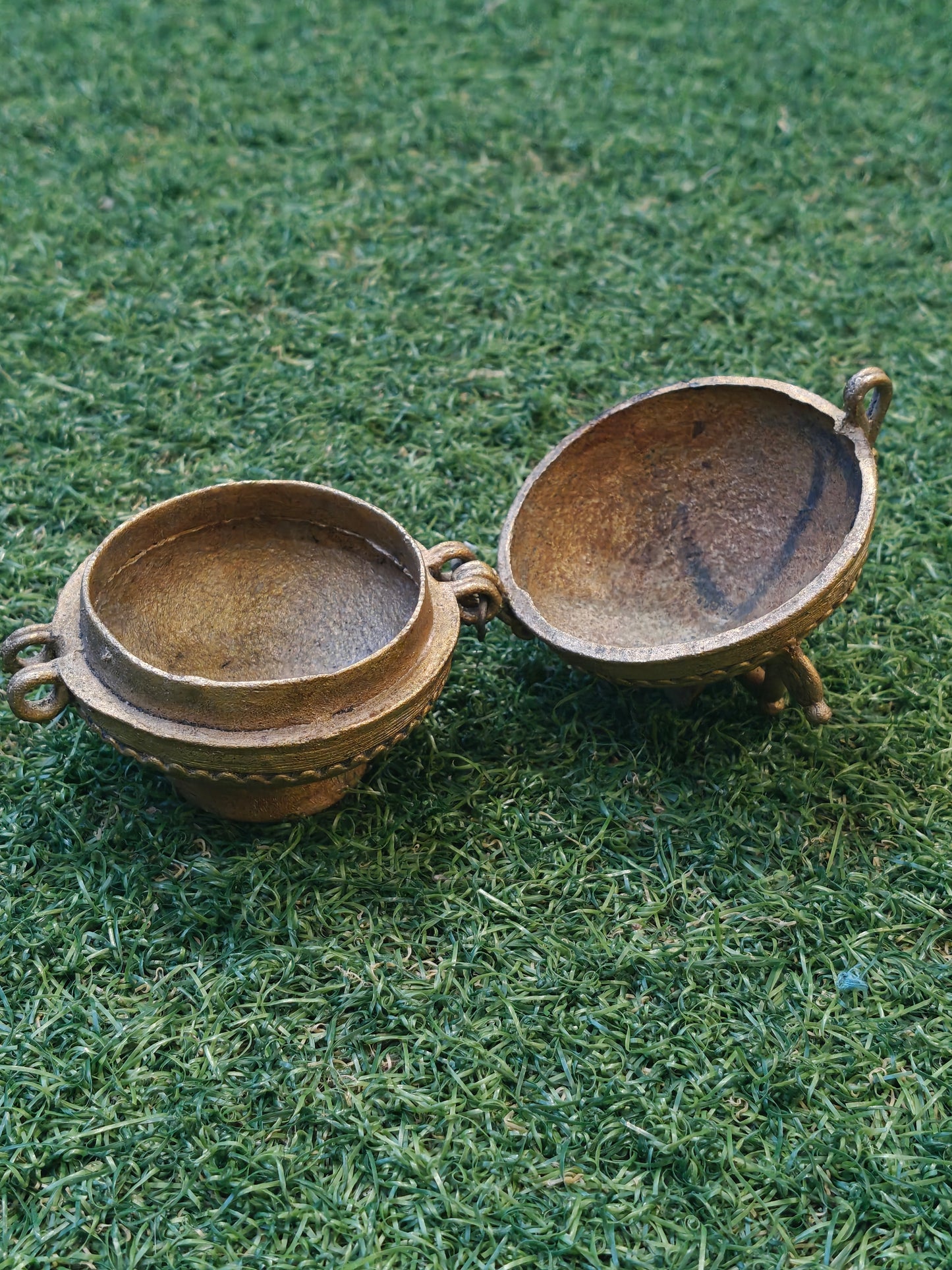 Brass spherical coin box with a bird on top - Dokra Brass handcrafted decor