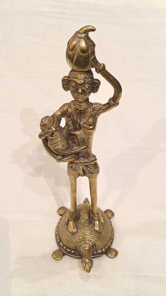 A Mother carrying her baby and standing on a tortoise - Handcrafted brass decor
