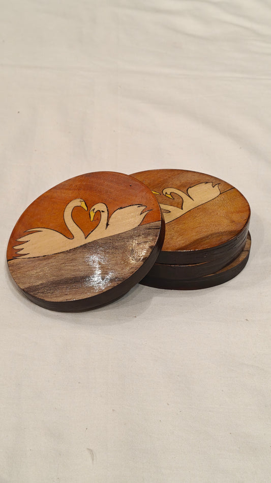 Handcrafted Wooden coaster with Swans design on it