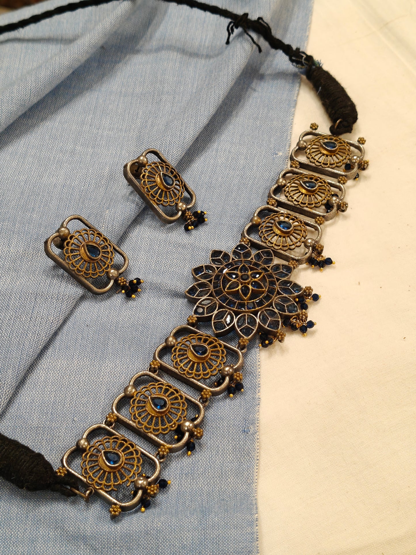 Blue stones choker and earrings set in gold silver dual tone