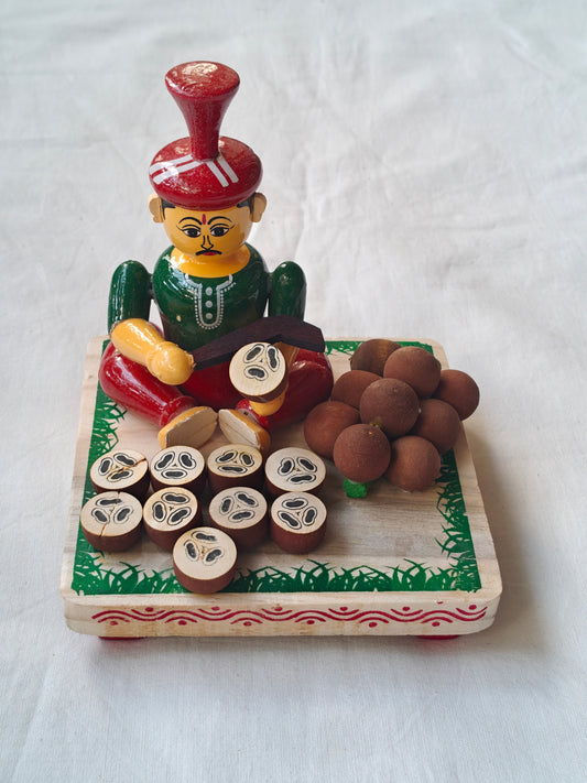 Man selling Ice apple  / Munjal - Etikoppaka Wooden handcrafted  decor