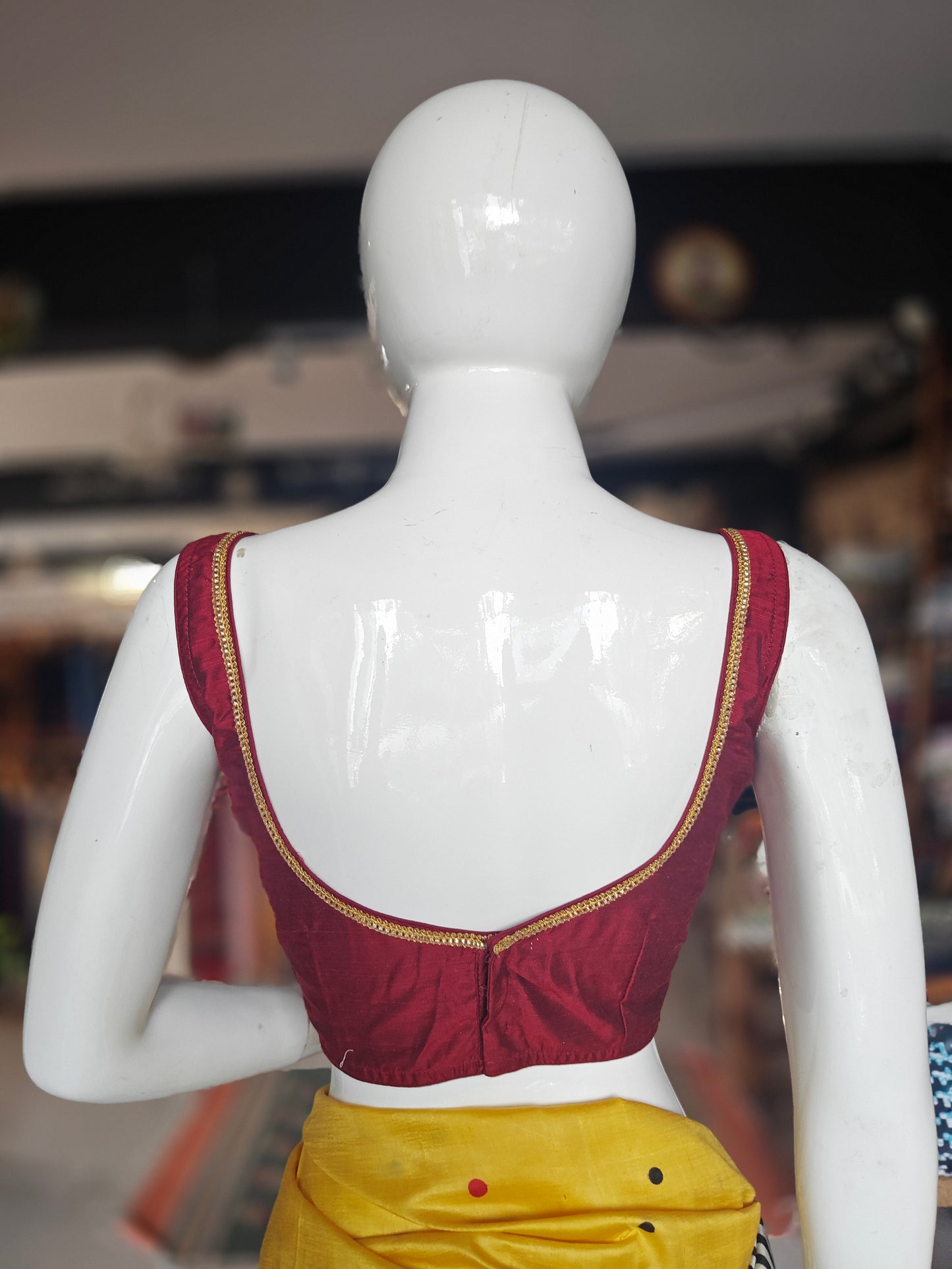 Raw silk back open sleeveless padded blouse with lace detailing