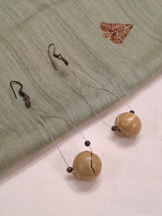 Green stone centred bead earrings