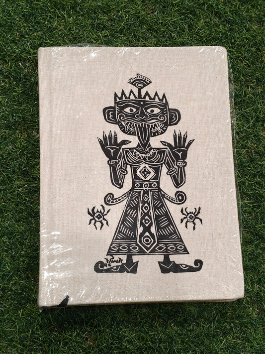 Ruled paper note book / journal with a hand painted man printed on the cover