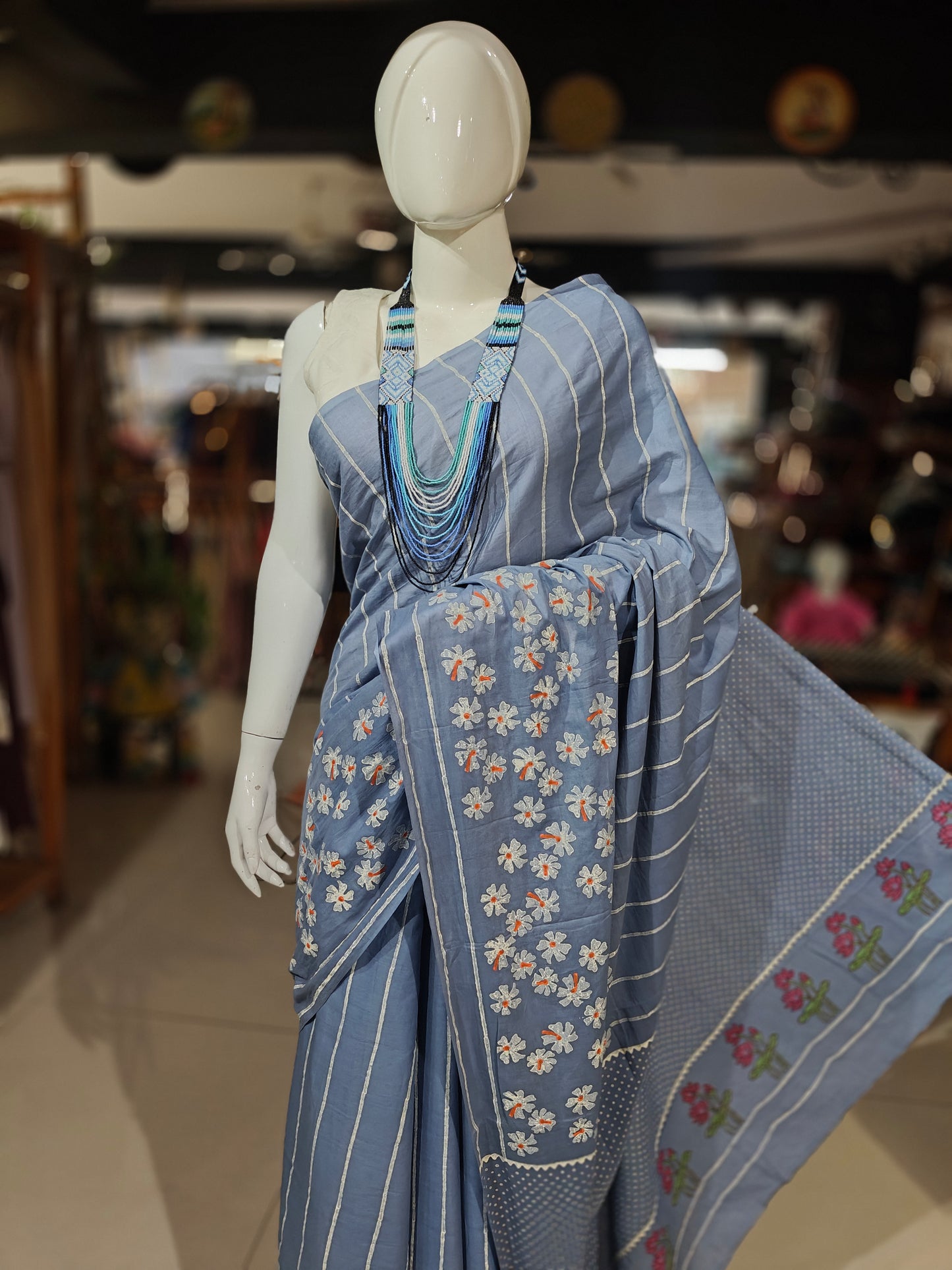 Parijat - the sacred flower - hand block printed light blue cotton saree