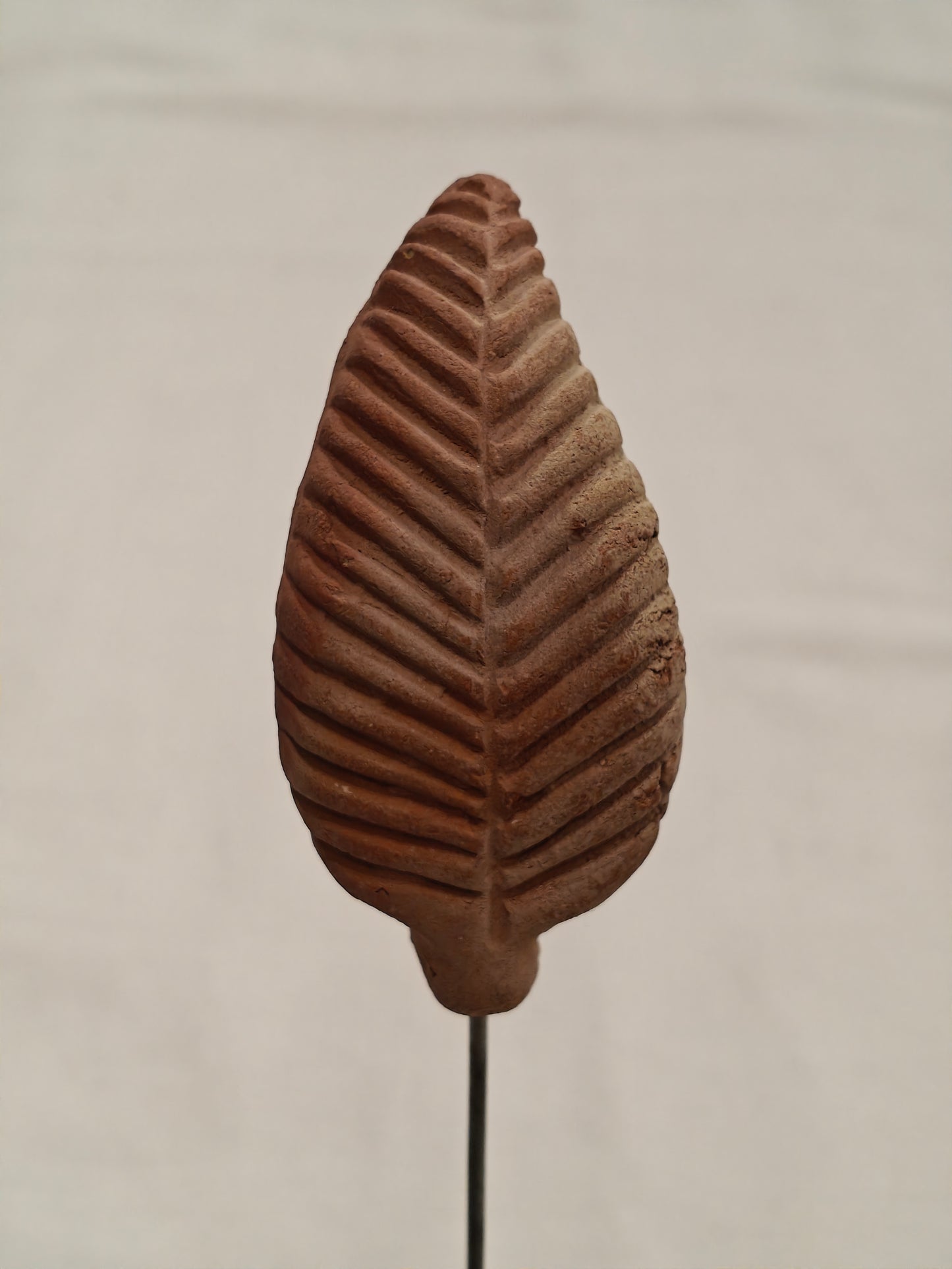 Handcrafted with clay garden stick