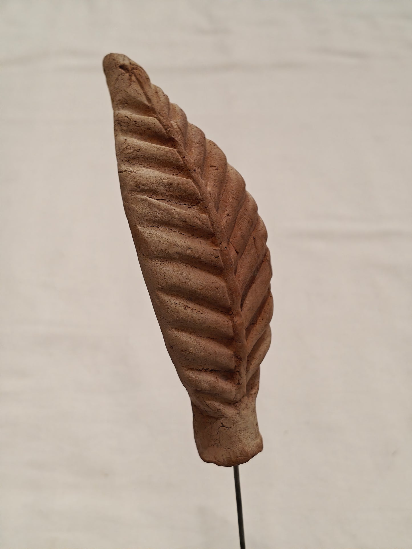 Handcrafted with clay garden stick