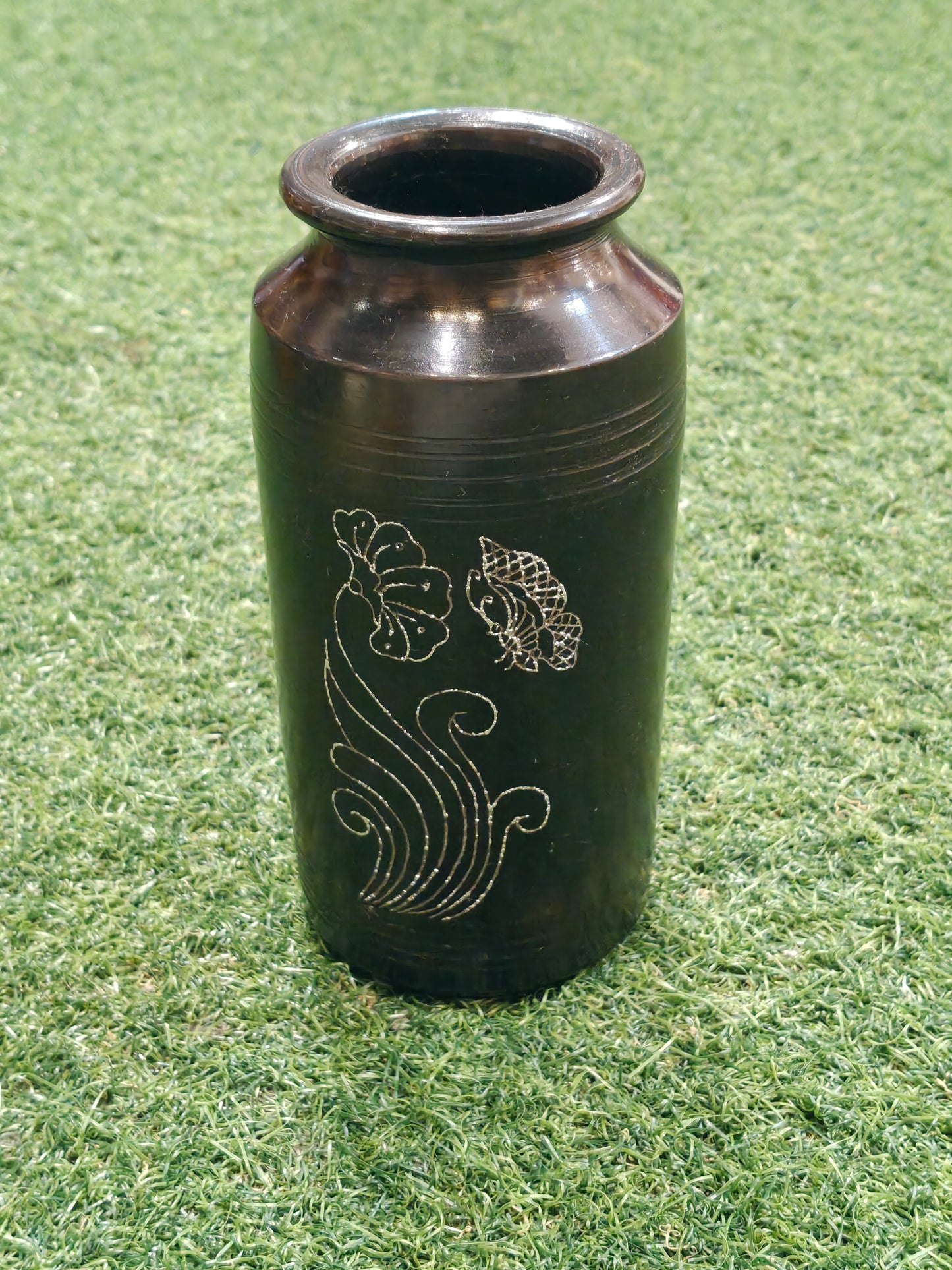 Black clay vase with flower engraving - traditional pottery