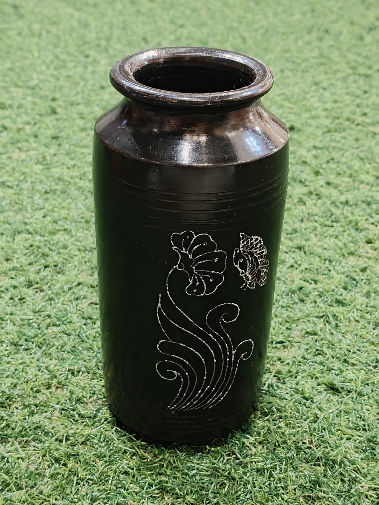 Black clay vase with flower engraving - traditional pottery