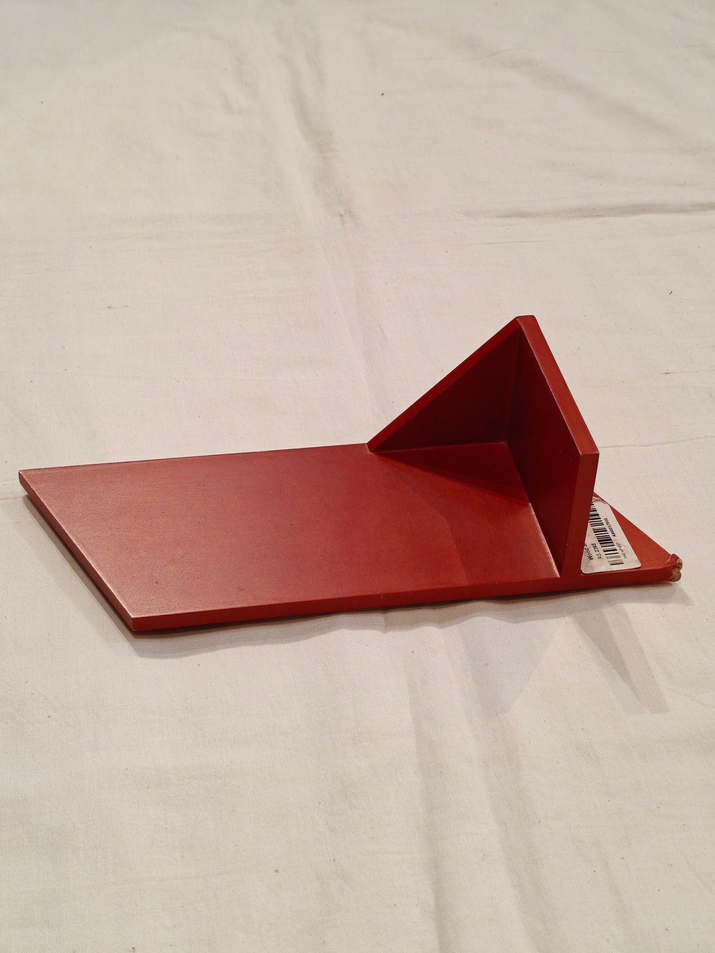 Red wooden wall shelf