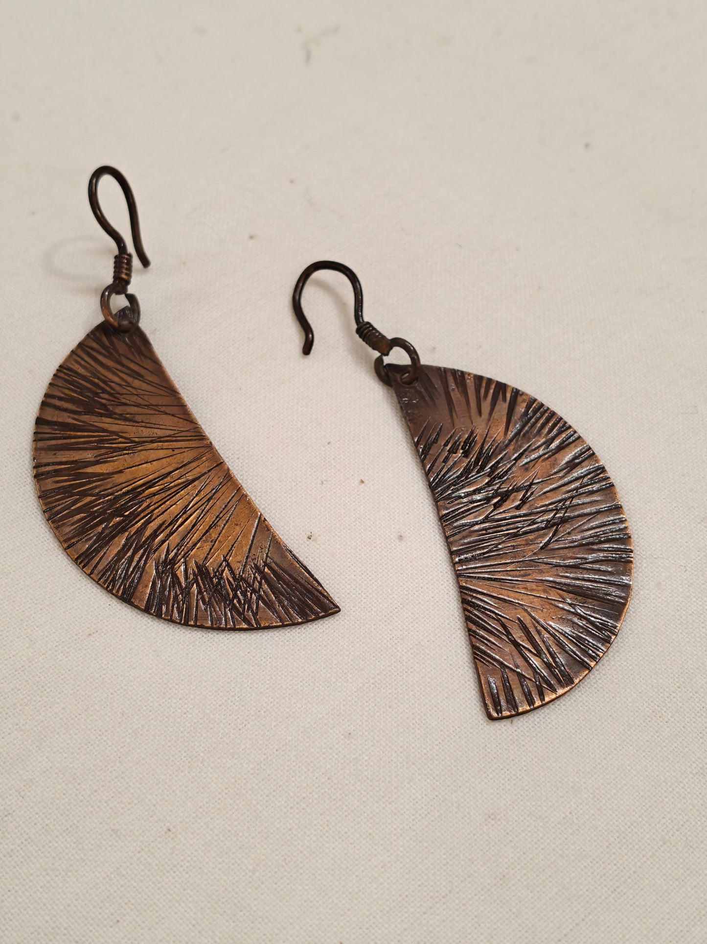 Semi circular copper earrings