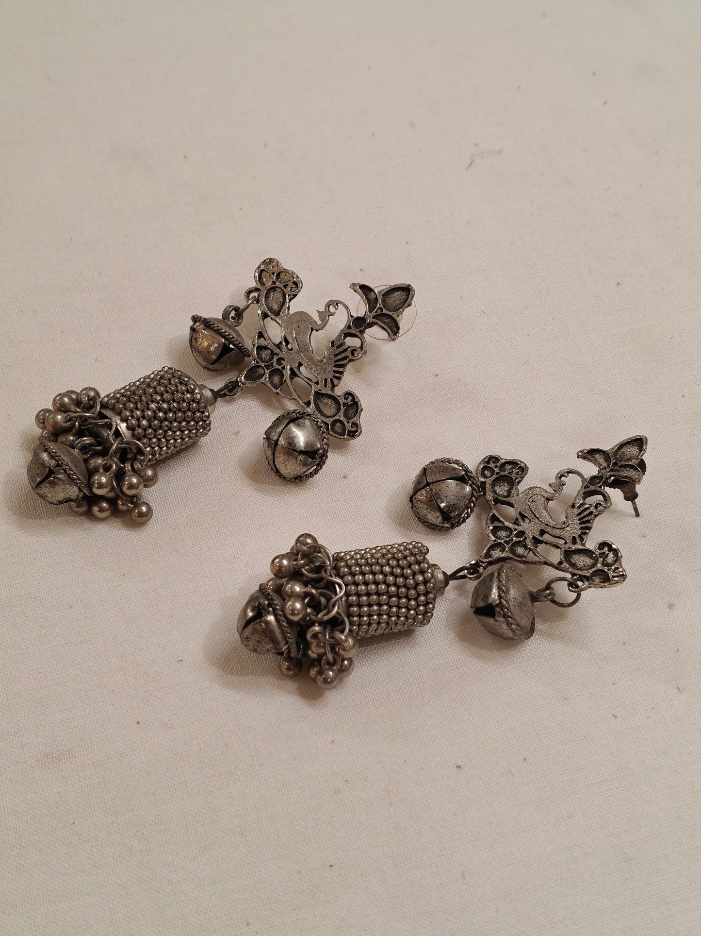 Bird cylindrical shaped with ghungru drops oxidised silver ear rings