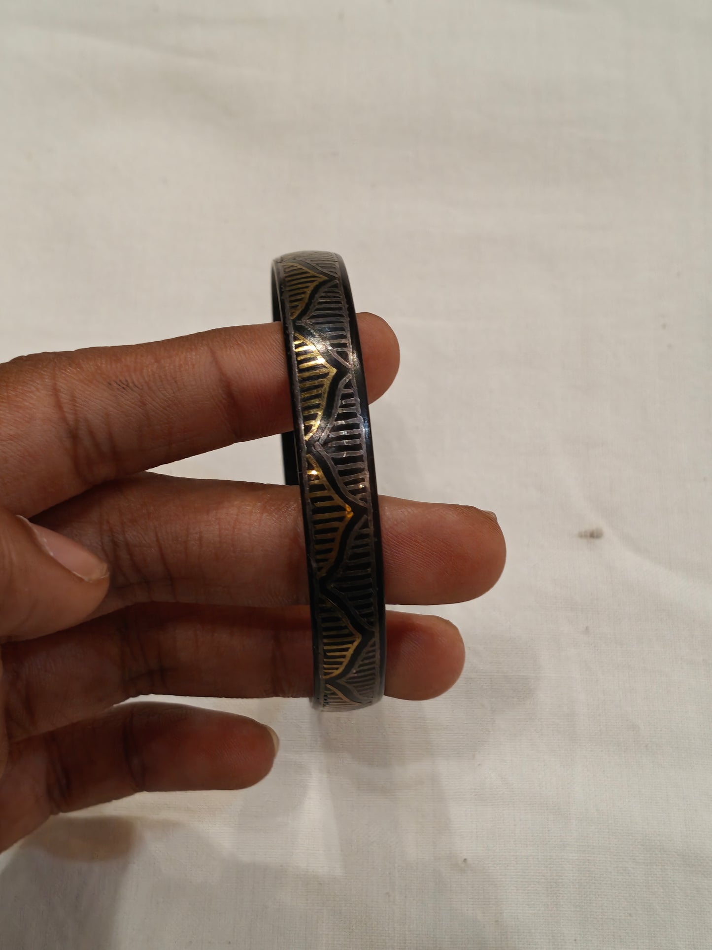 Black bidri style silver inlay bangle with golden and silver dome patterns - single