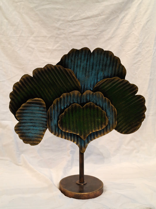 Green blue metal tree with circular base handcrafted decor