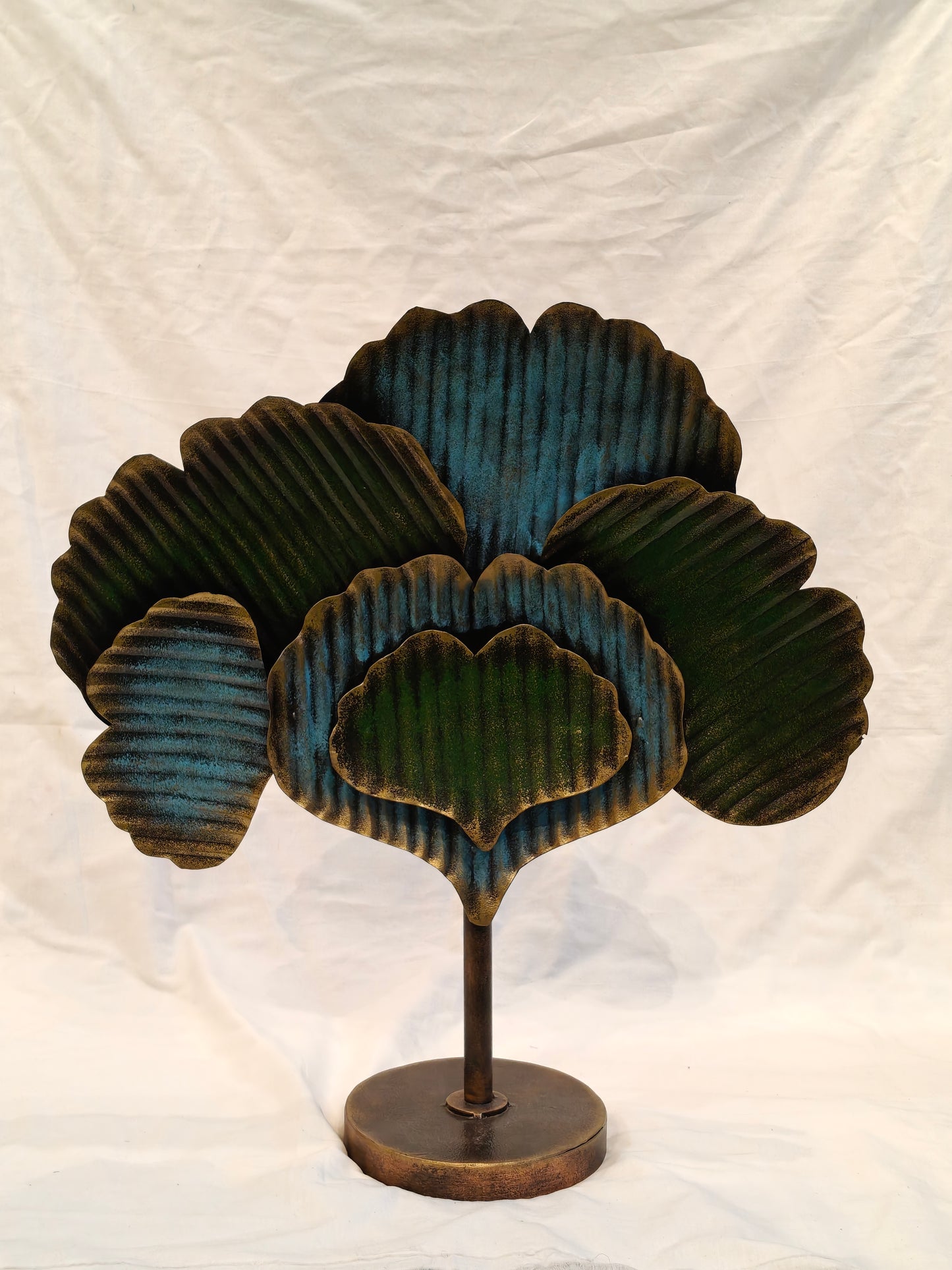 Green blue metal tree with circular base handcrafted decor