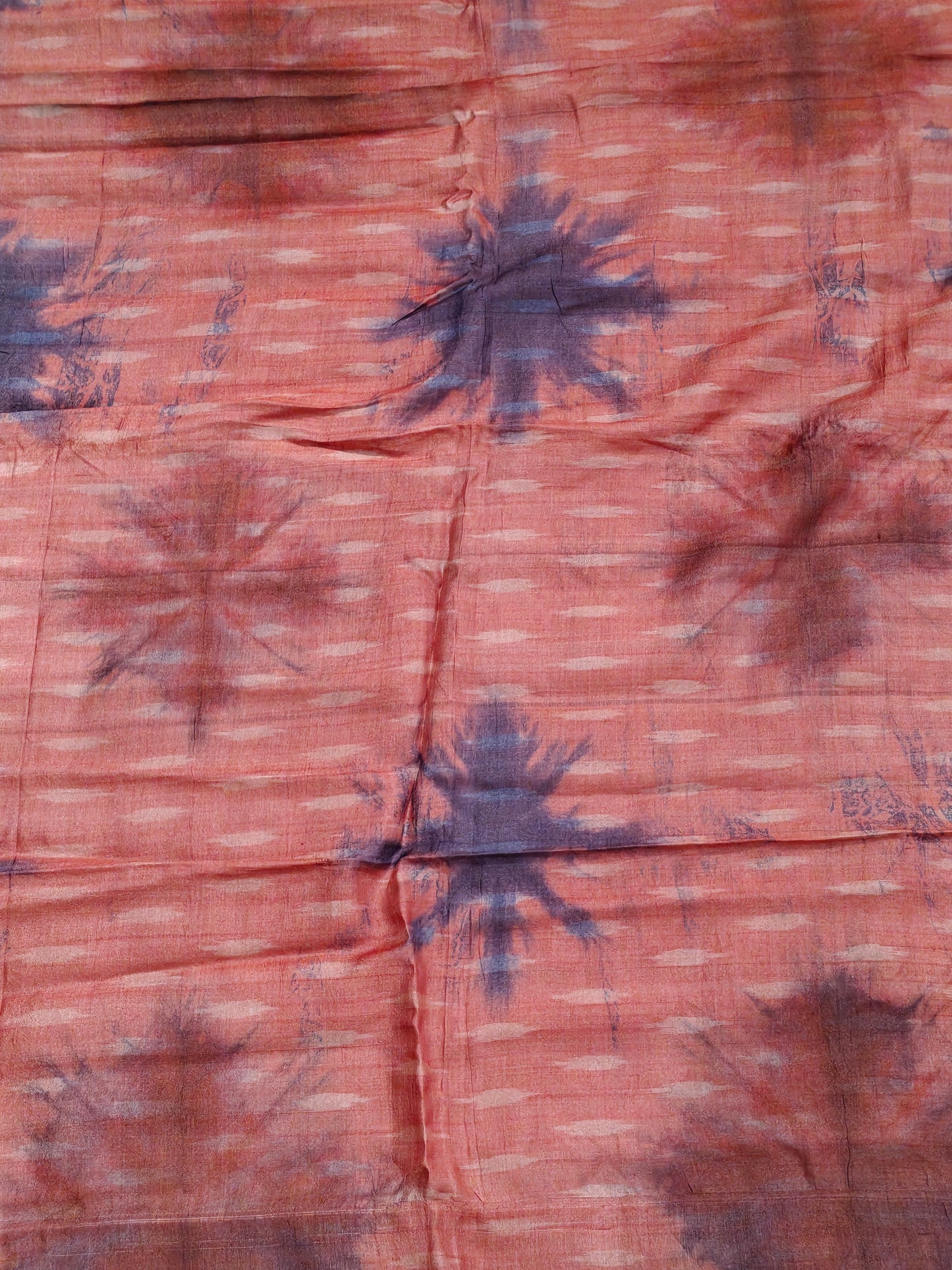 Red and purple thigh reeled tussar silk clamp dyed handwoven fabric