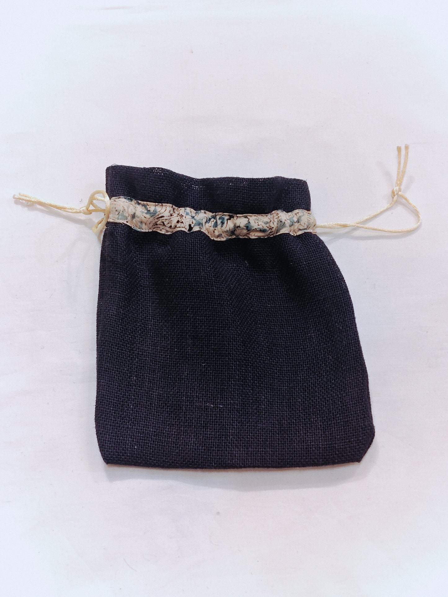 Blue jute potli with kalamkari cotton dori