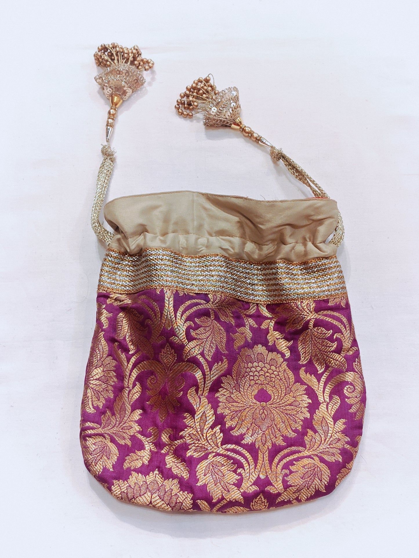 Pink n cream floral silk potli with ghungroos