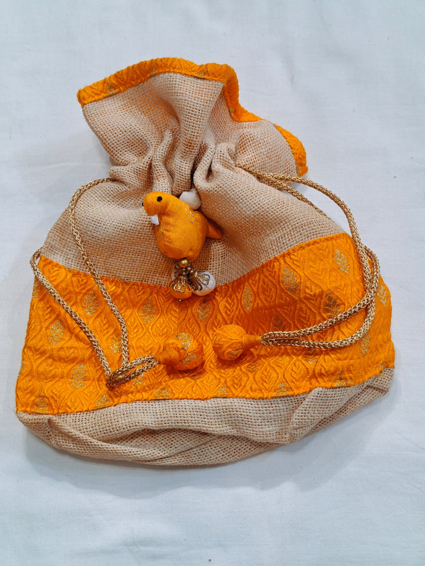 Yellow handcrafted jute banaras bag