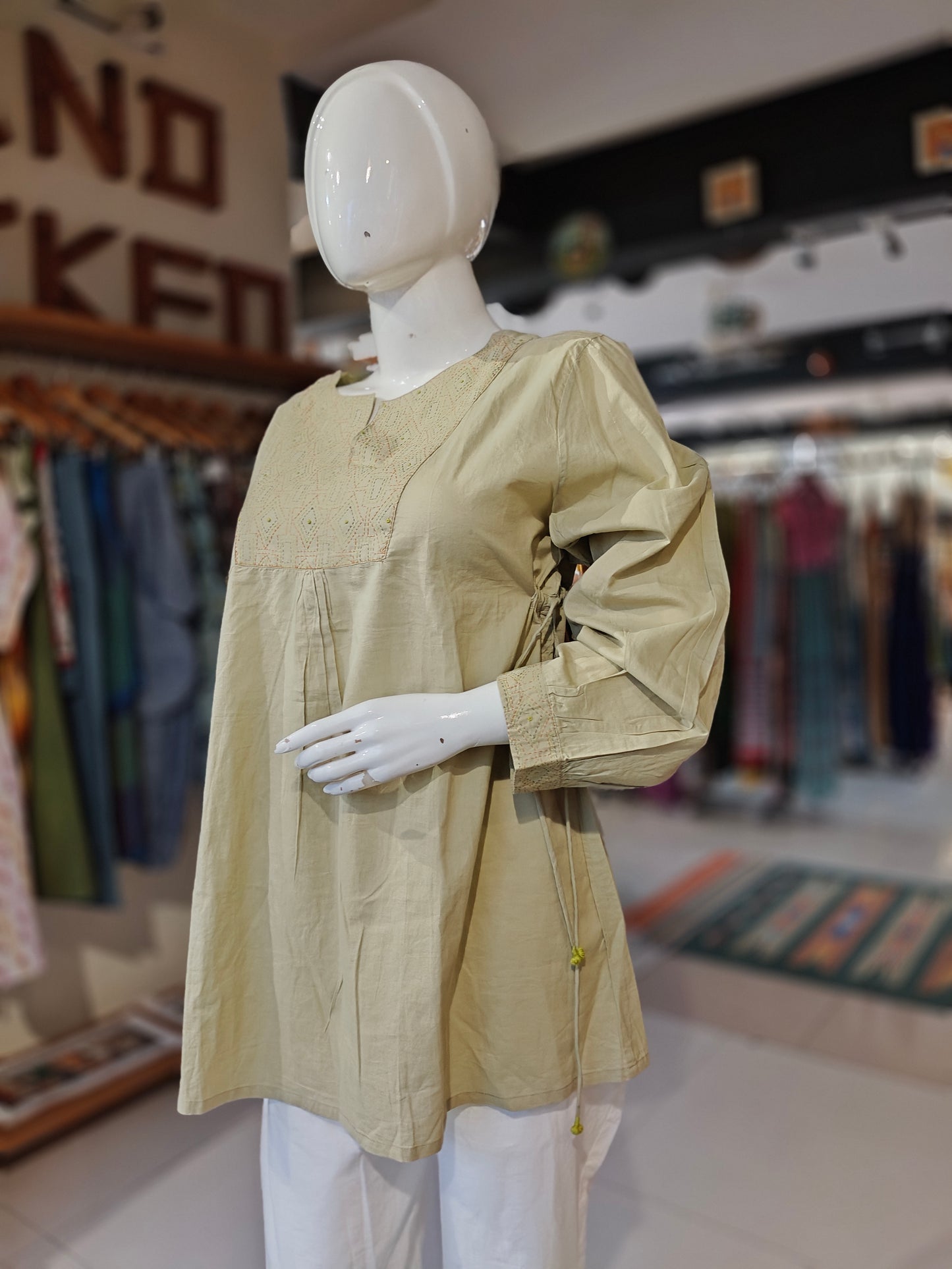 Green embroidered cotton top with waist draw string