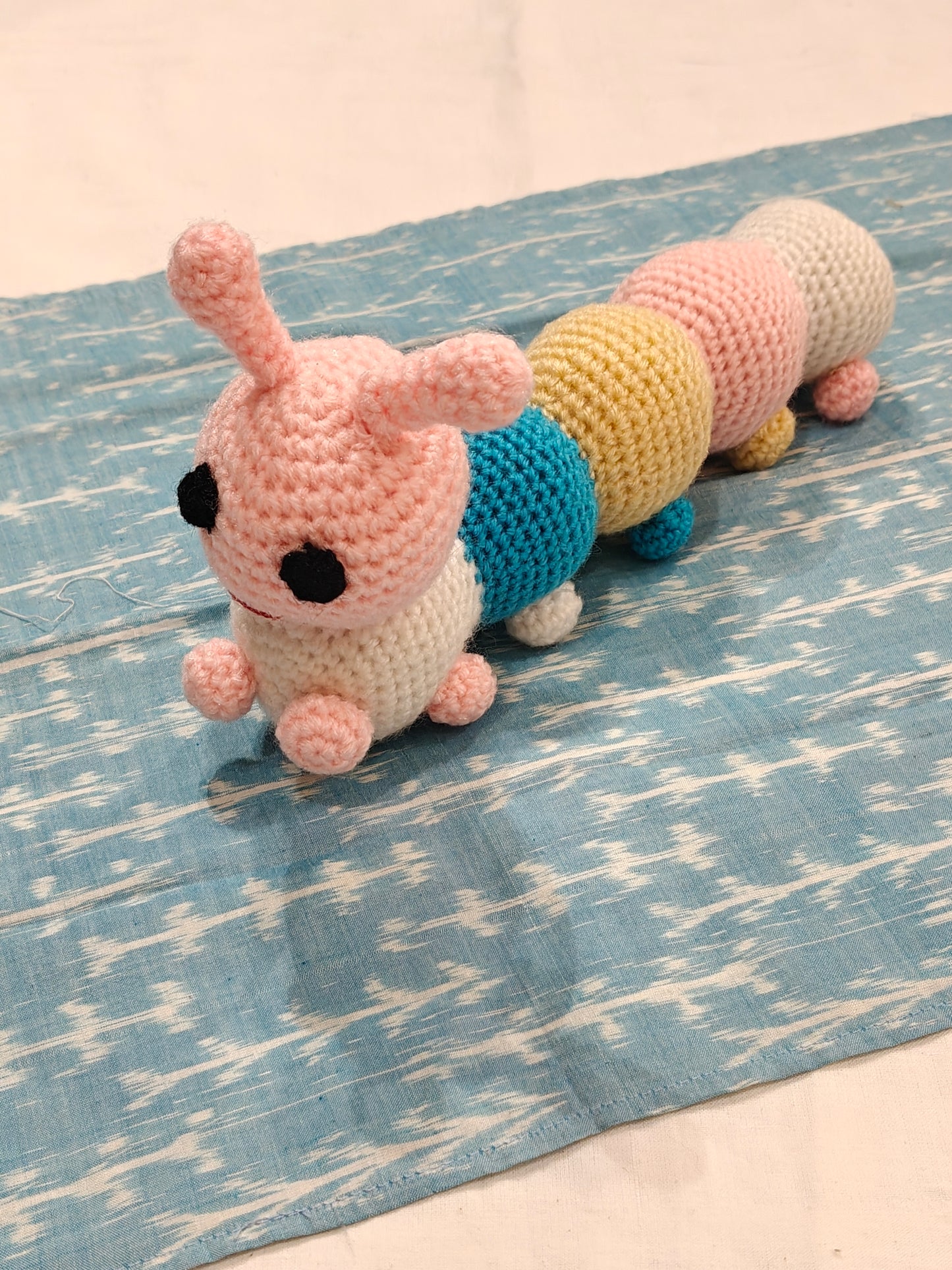 Cute caterpillar with a face - handcrafted crochet