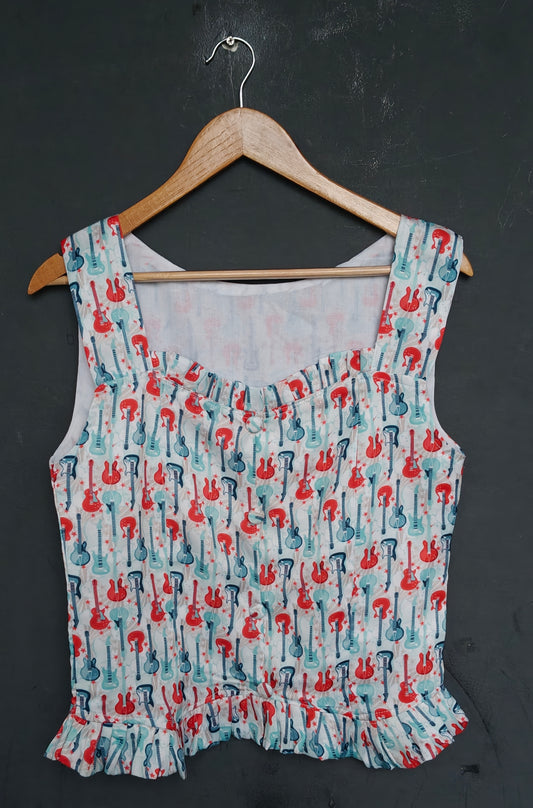 Quirky guitar printed top - frills at neck and hem