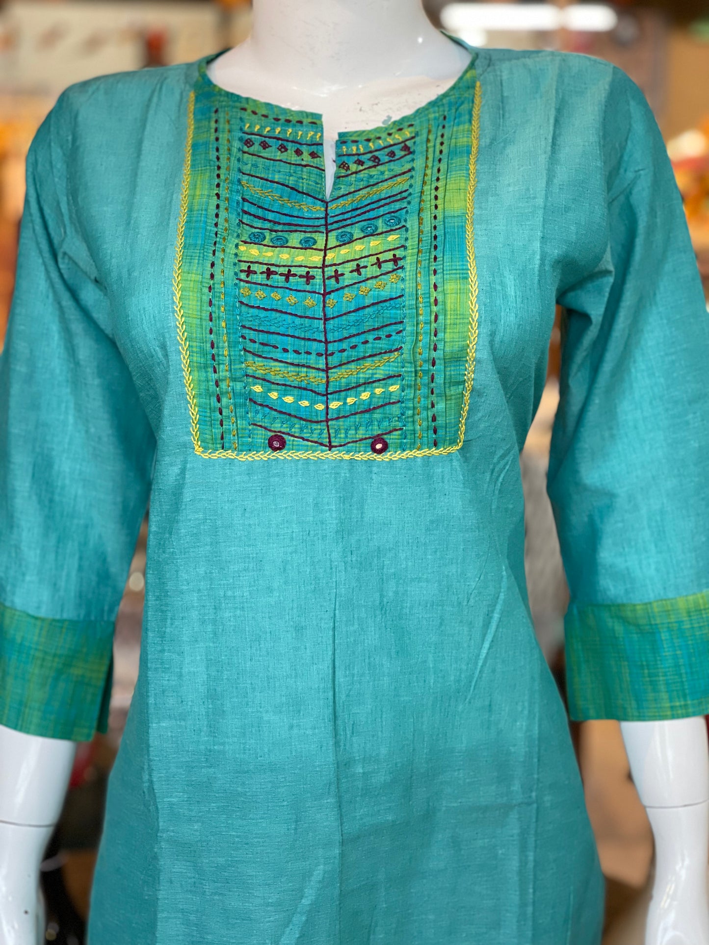 Sea Green cotton kurti with hand embroidery on yoke