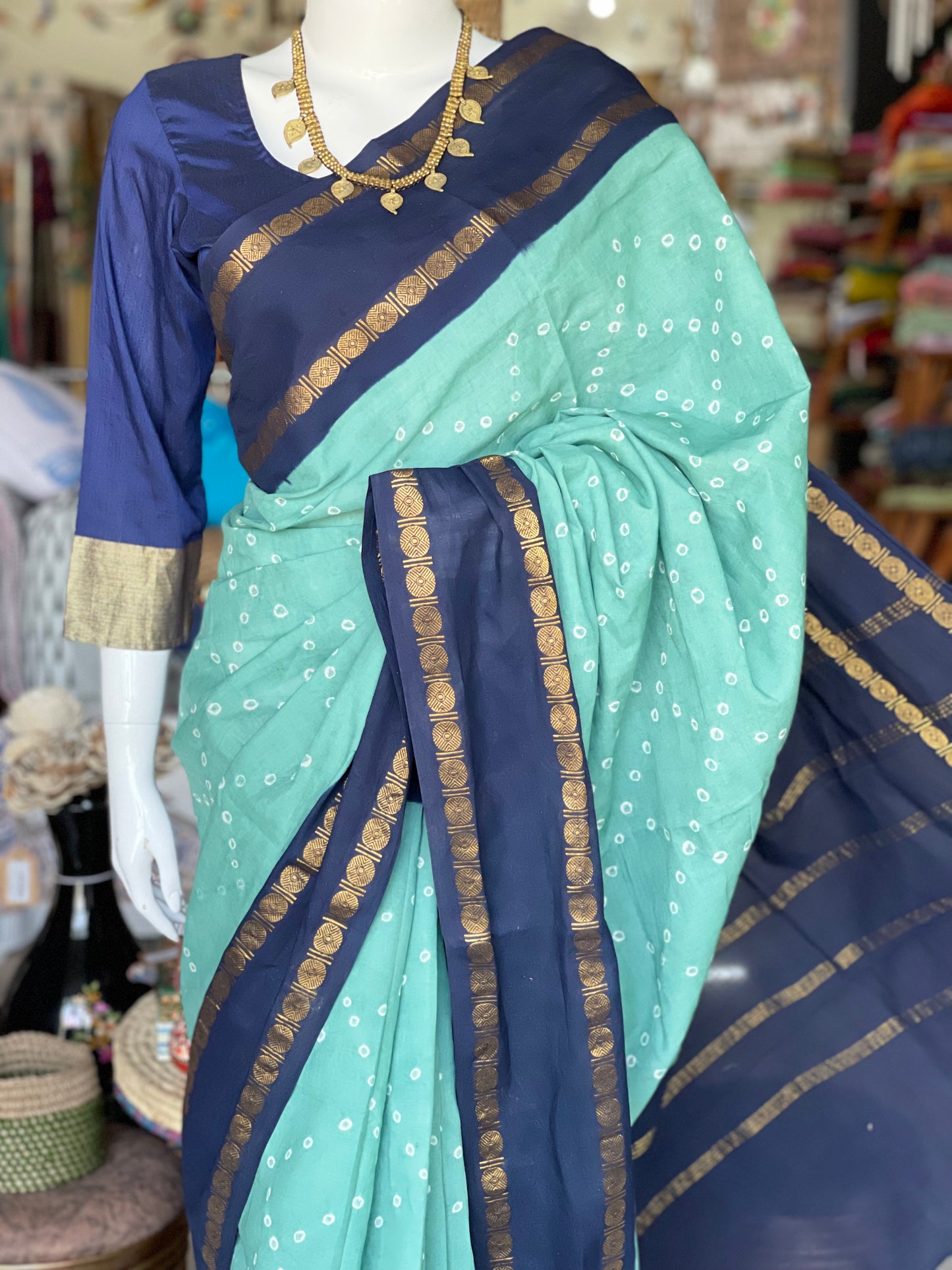 Sea green Madurai hand knotted Sungudi cotton saree with navy blue border