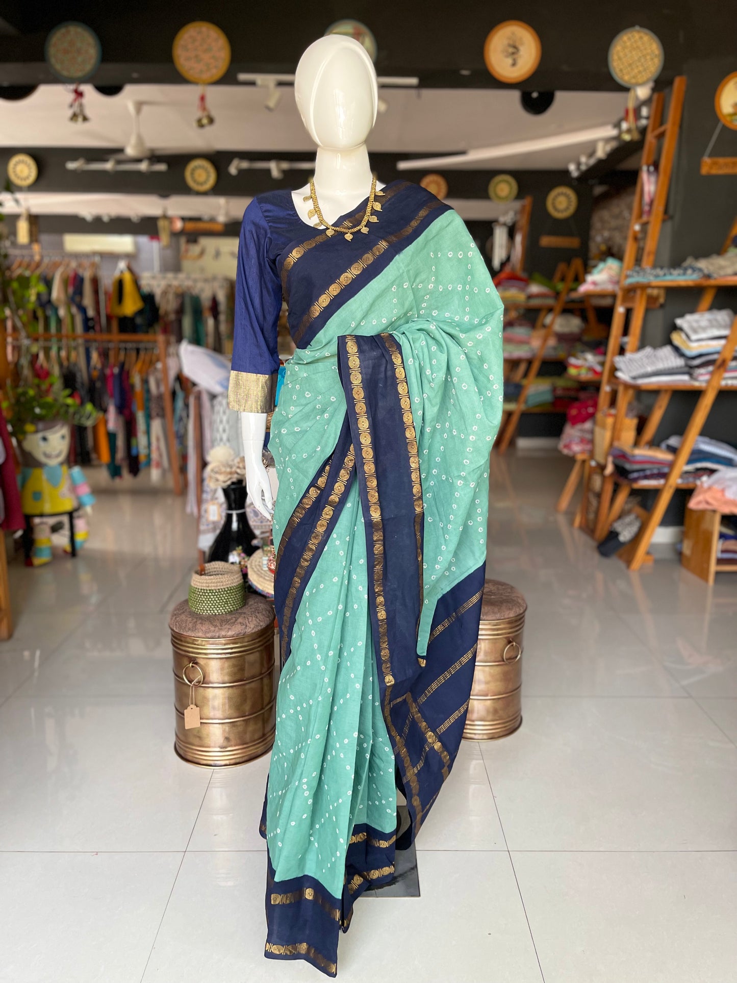Sea green Madurai hand knotted Sungudi cotton saree with navy blue border