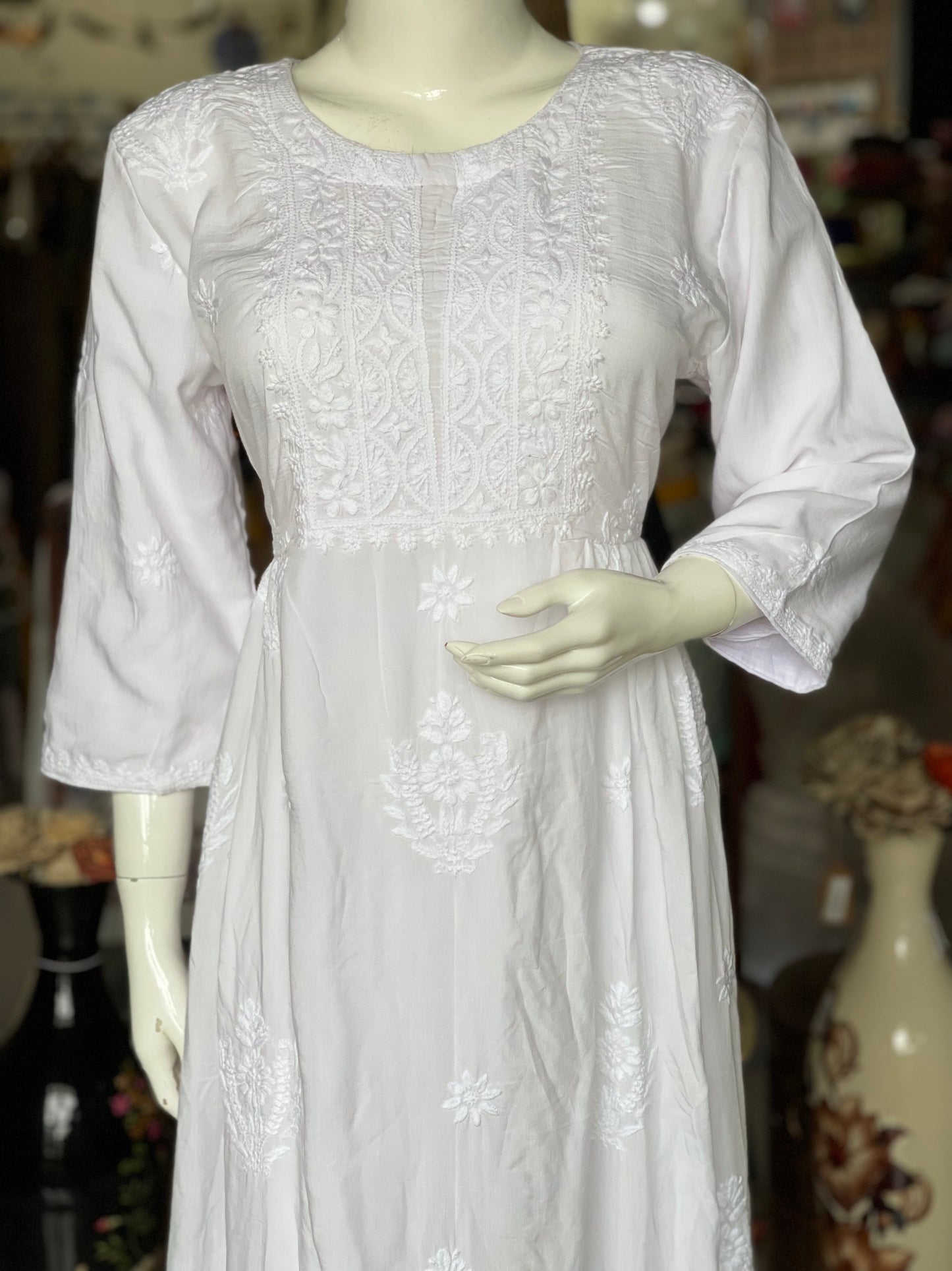 White chikankari hand embroidered rayon dress with gathers at waist and long sleeves