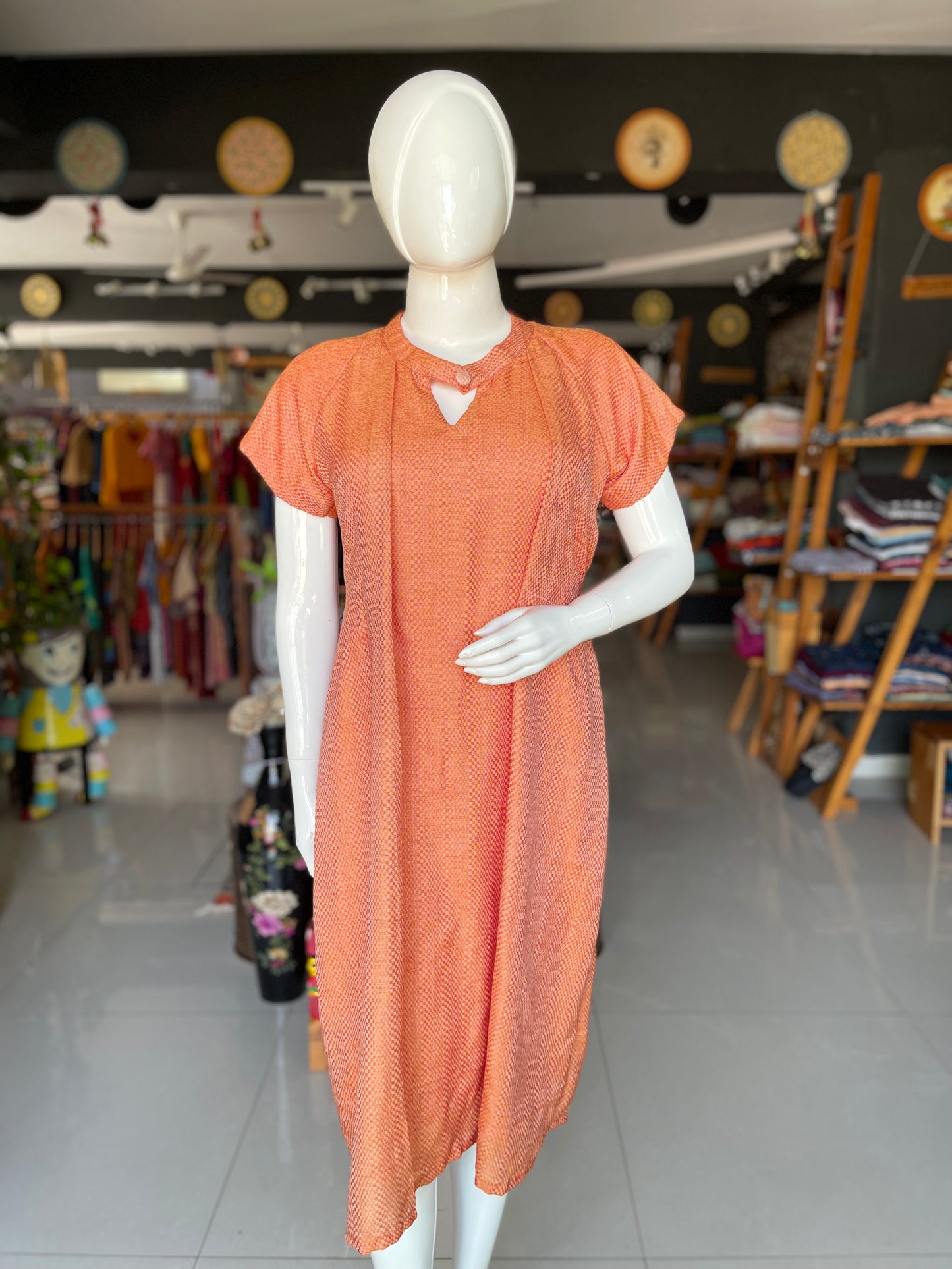 Orange textured 4 pedal handwoven cotton dress with raglan sleeves and belt