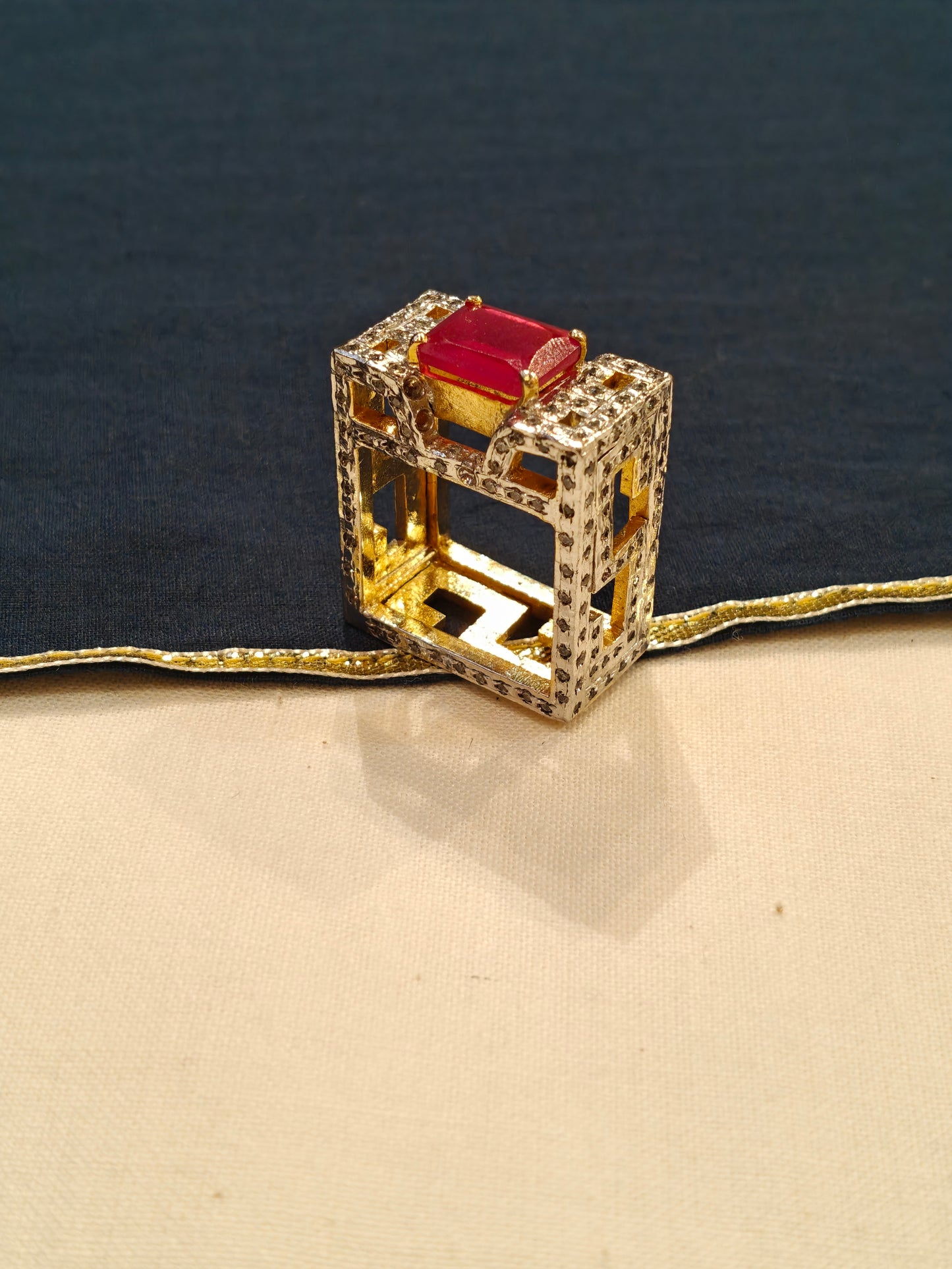 Square shaped finger ring with red stone