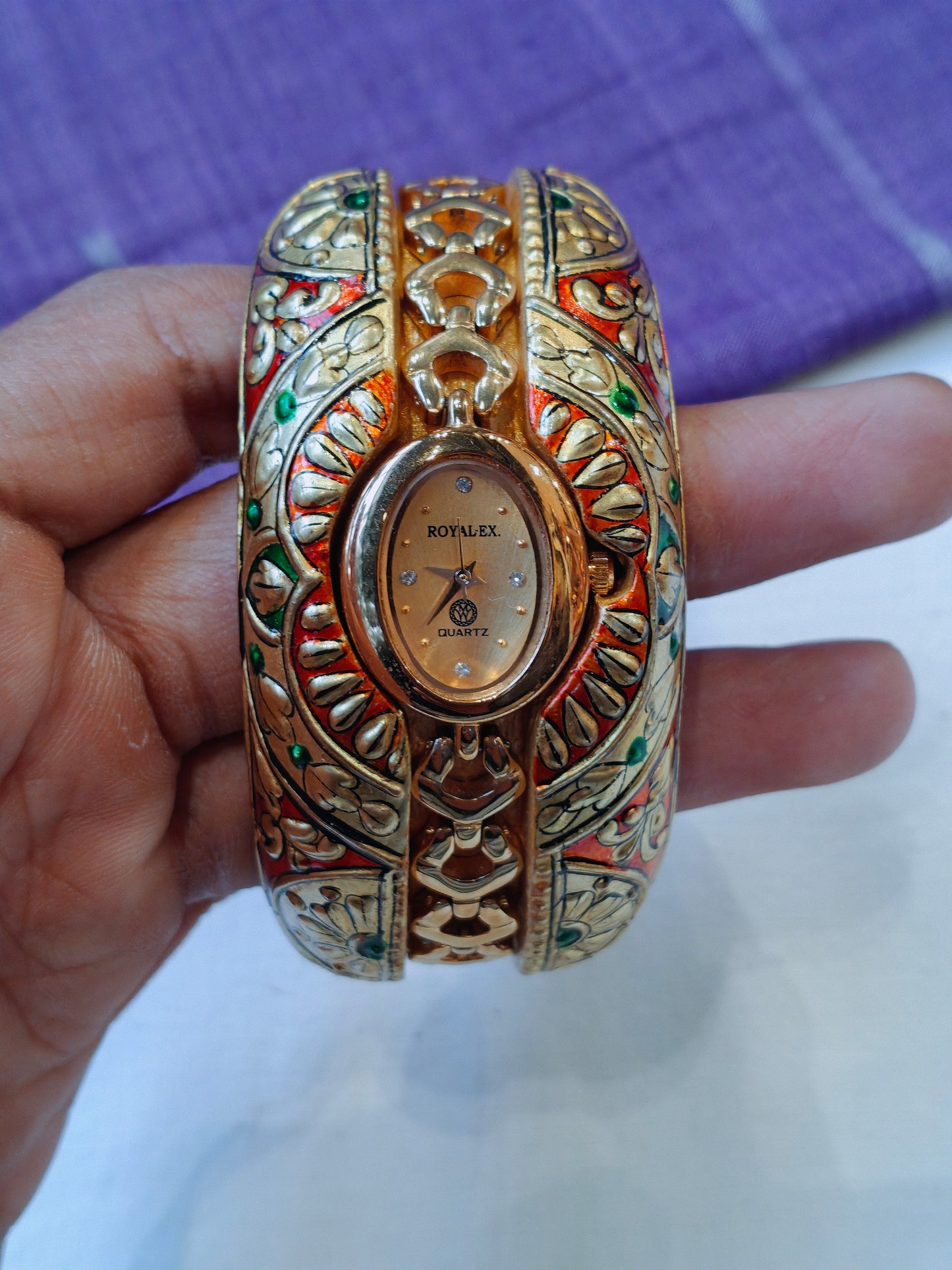 Red gold leaf embossed wide bracelet bangle cum watch