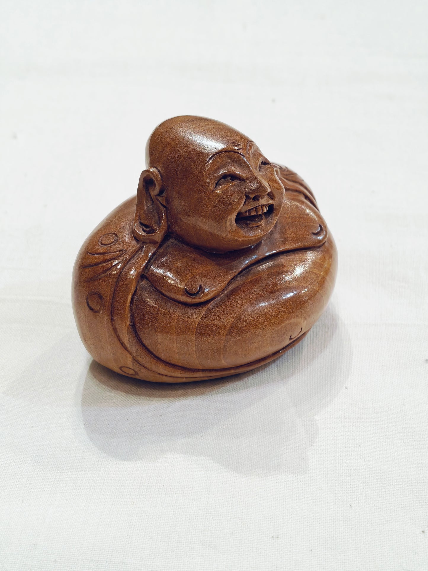 Laughing buddha in Hancrafted wood - table decor / paper weight