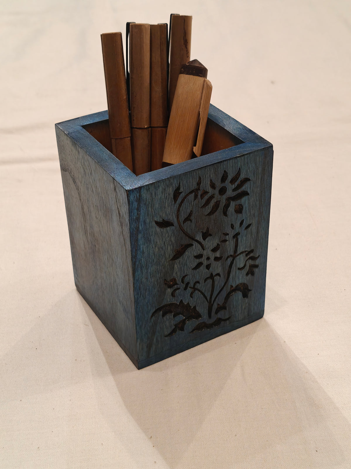 Wooden handcrafted pen stand with carved design on it - available in different colors