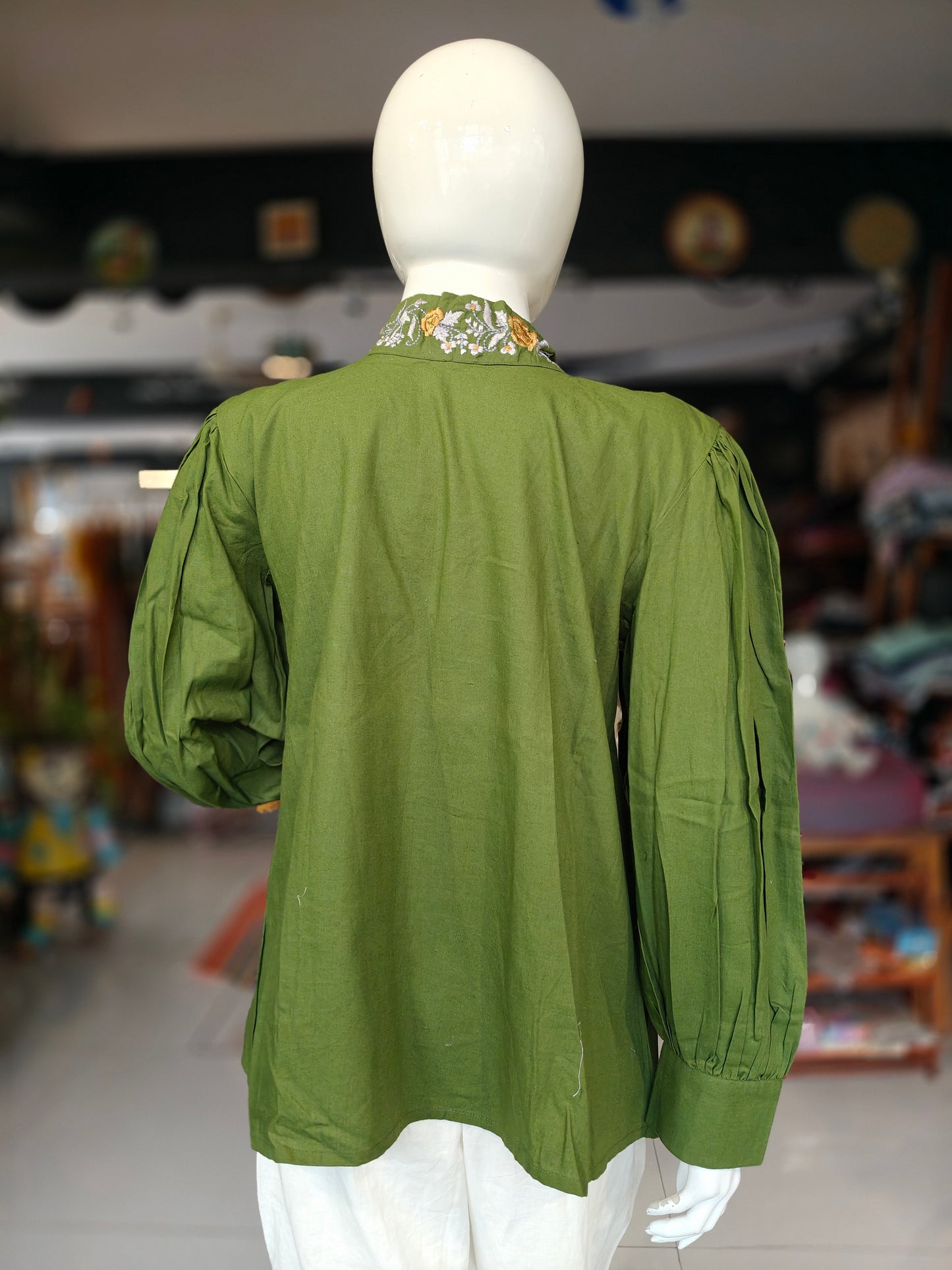 Green cotton top with embroidered collar and long sleeves
