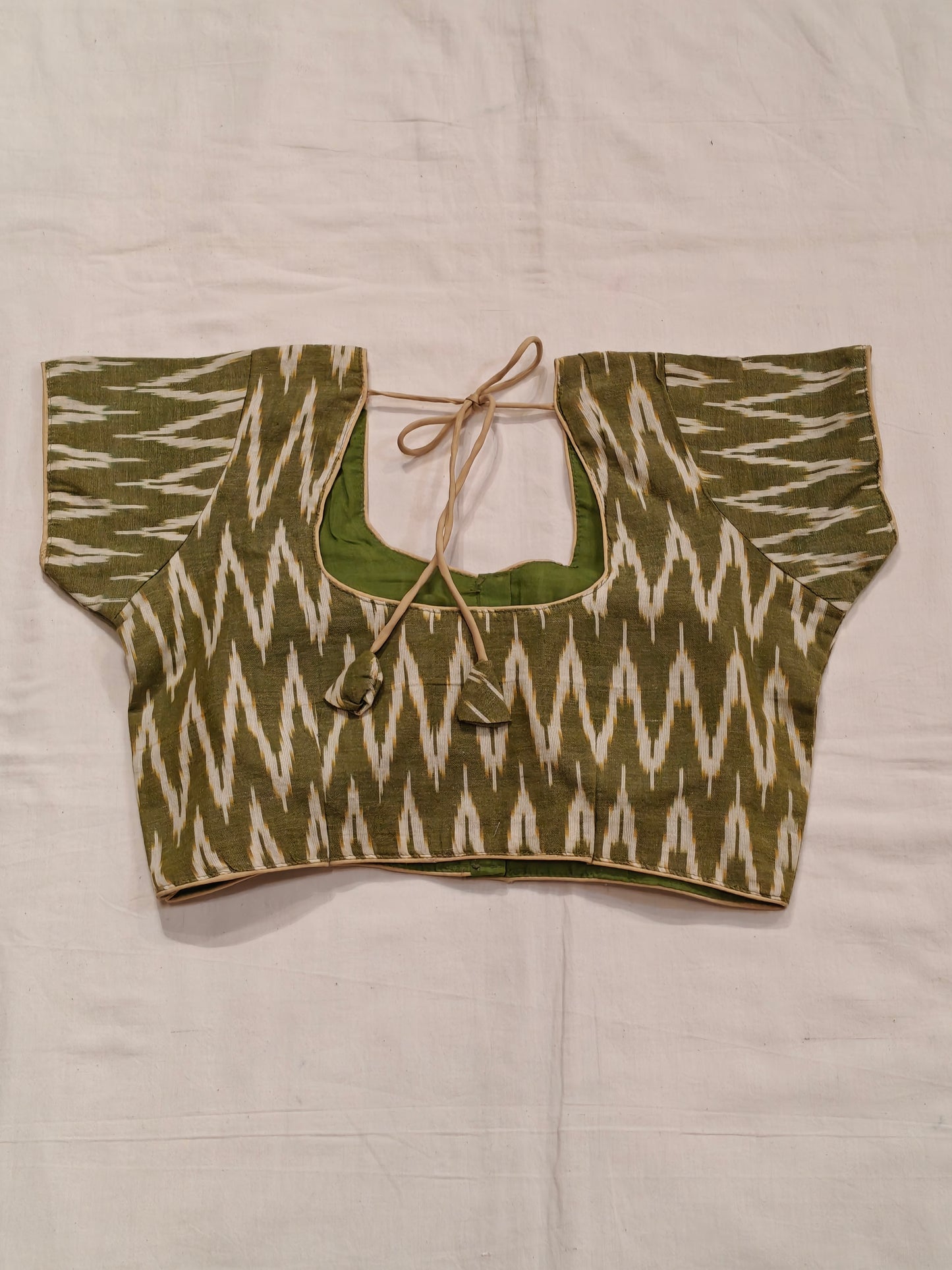 Mehndi green and cream ikat short sleeves padded blouse