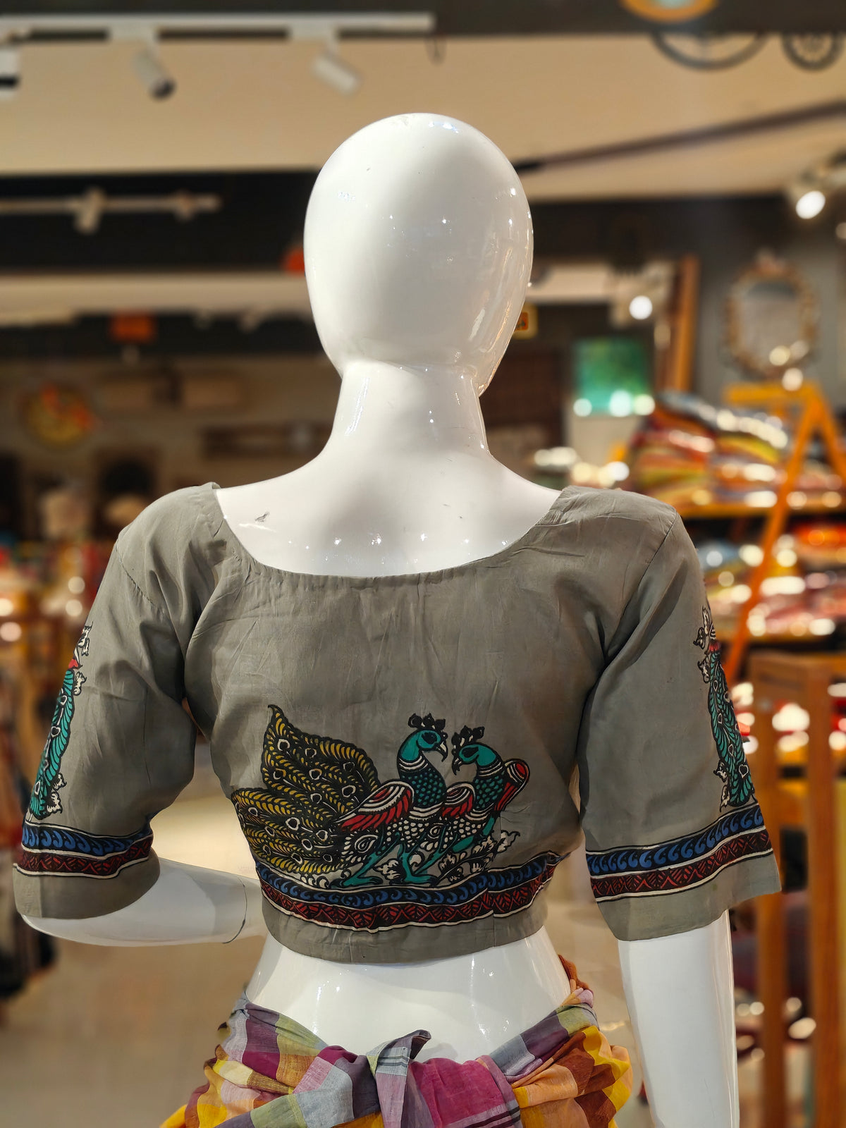 Grey with peacocks on sleeves n back hand-painted Pen Kalamkari silk blouse