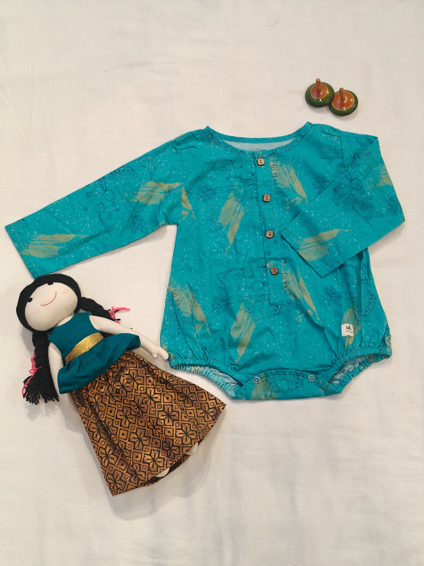 Sea green printed full sleeves romper - unisex