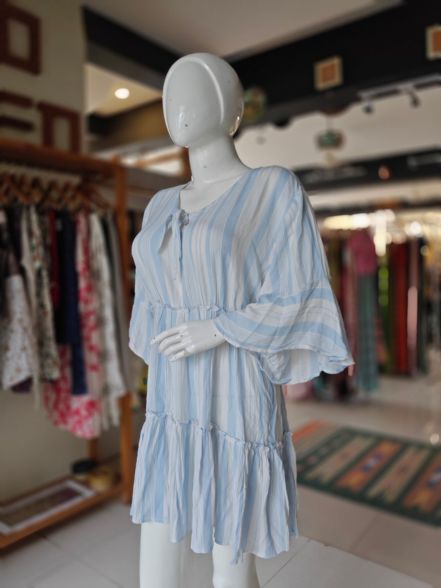 White and blue striped knee length crushed cotton tiered dress
