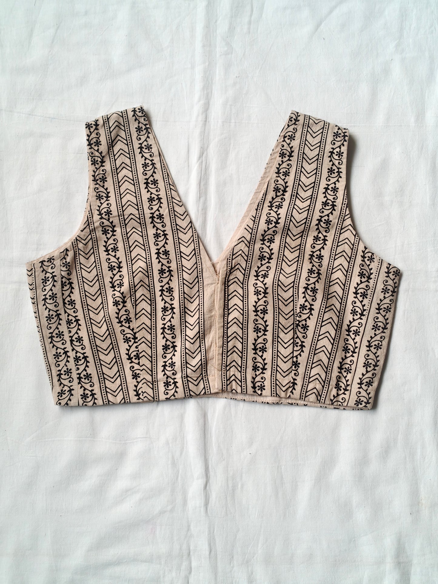 Beige handblock printed cotton v-neck blouse with vine patterns