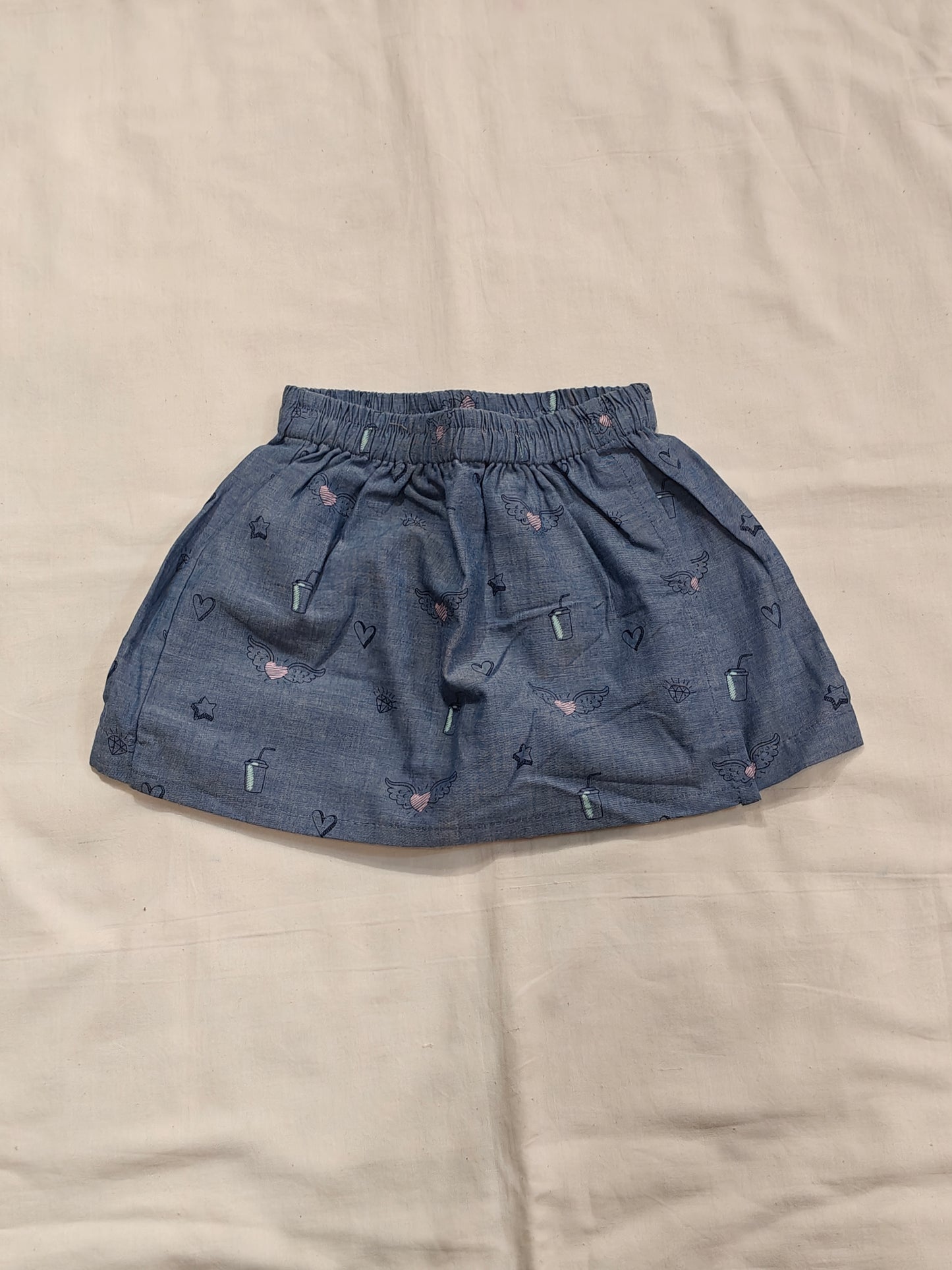 Blue skorts with hearts and juice prints for girls