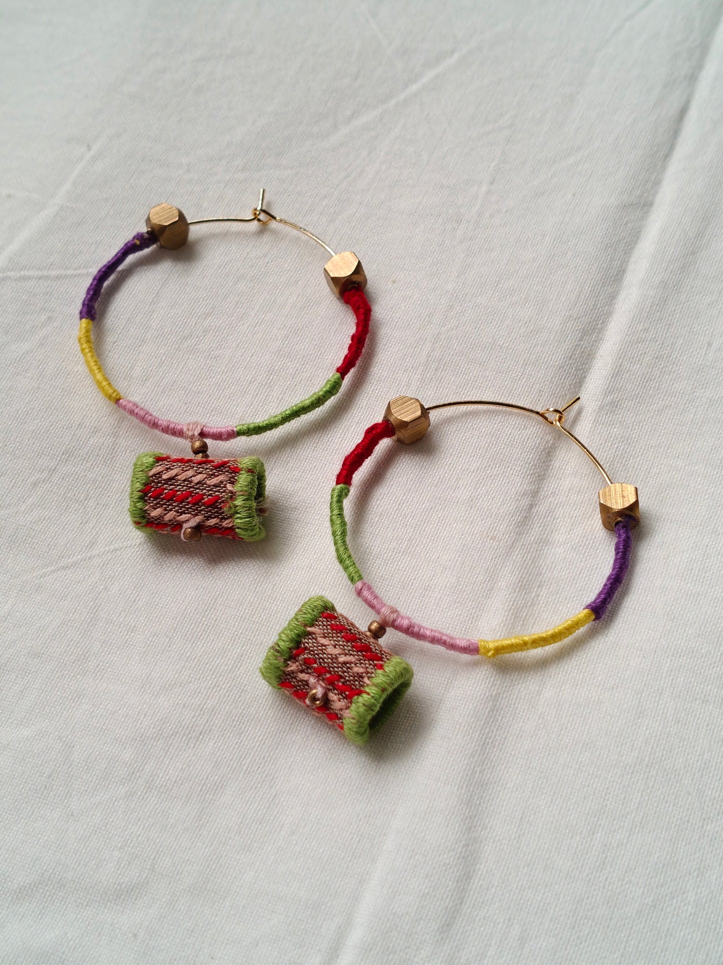 Colorful thread-wrapped hoops with brass beads - handcrafted earrings
