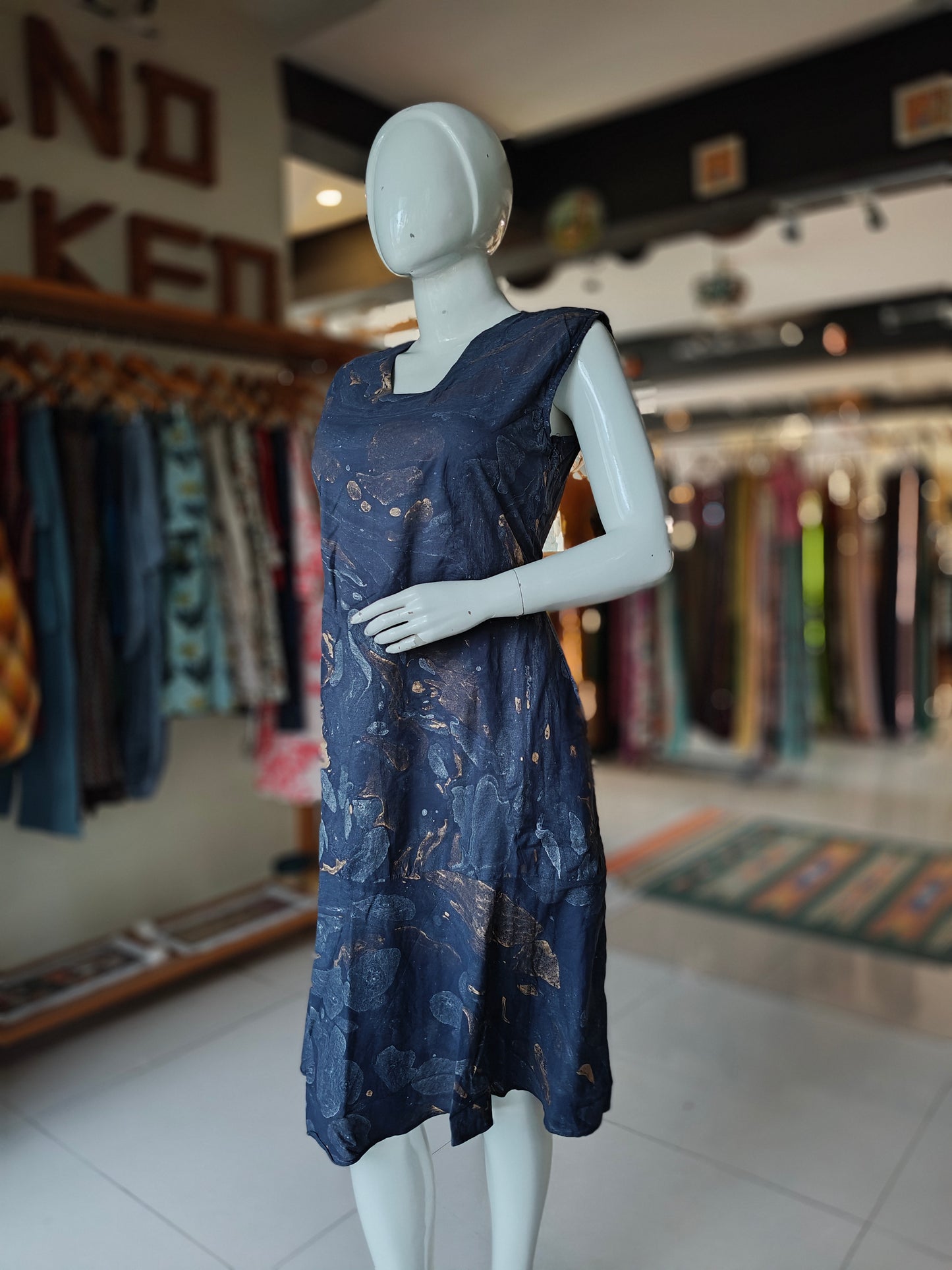 Navy blue and golden marble printed sleeveless cotton dress with umbrella hem