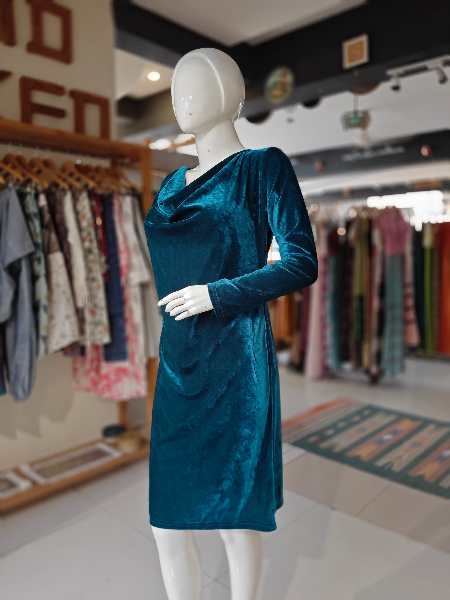 Green velvet cowl neck dress