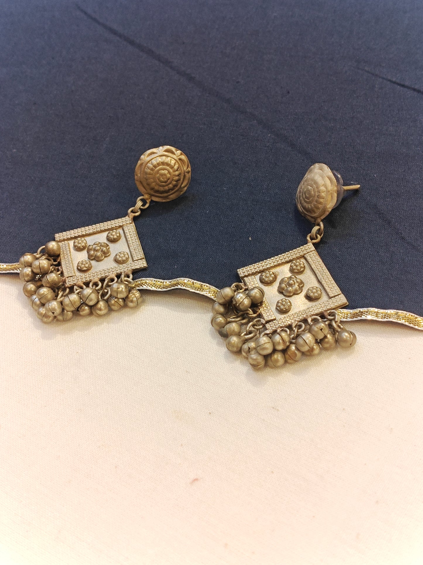 Diamond shaped stud earrings with flower patters and ghungros - handcrafted