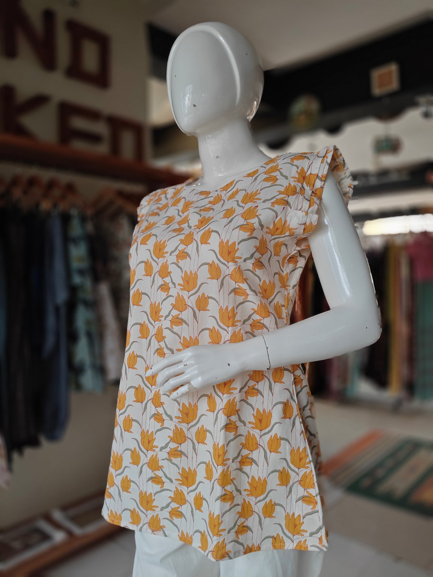 White with yellow floral printed handwoven cotton short kurti / top
