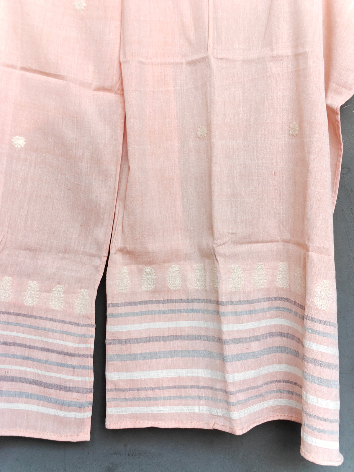 Light peach handloom bamboo x cotton stole with white floral butis and striped border