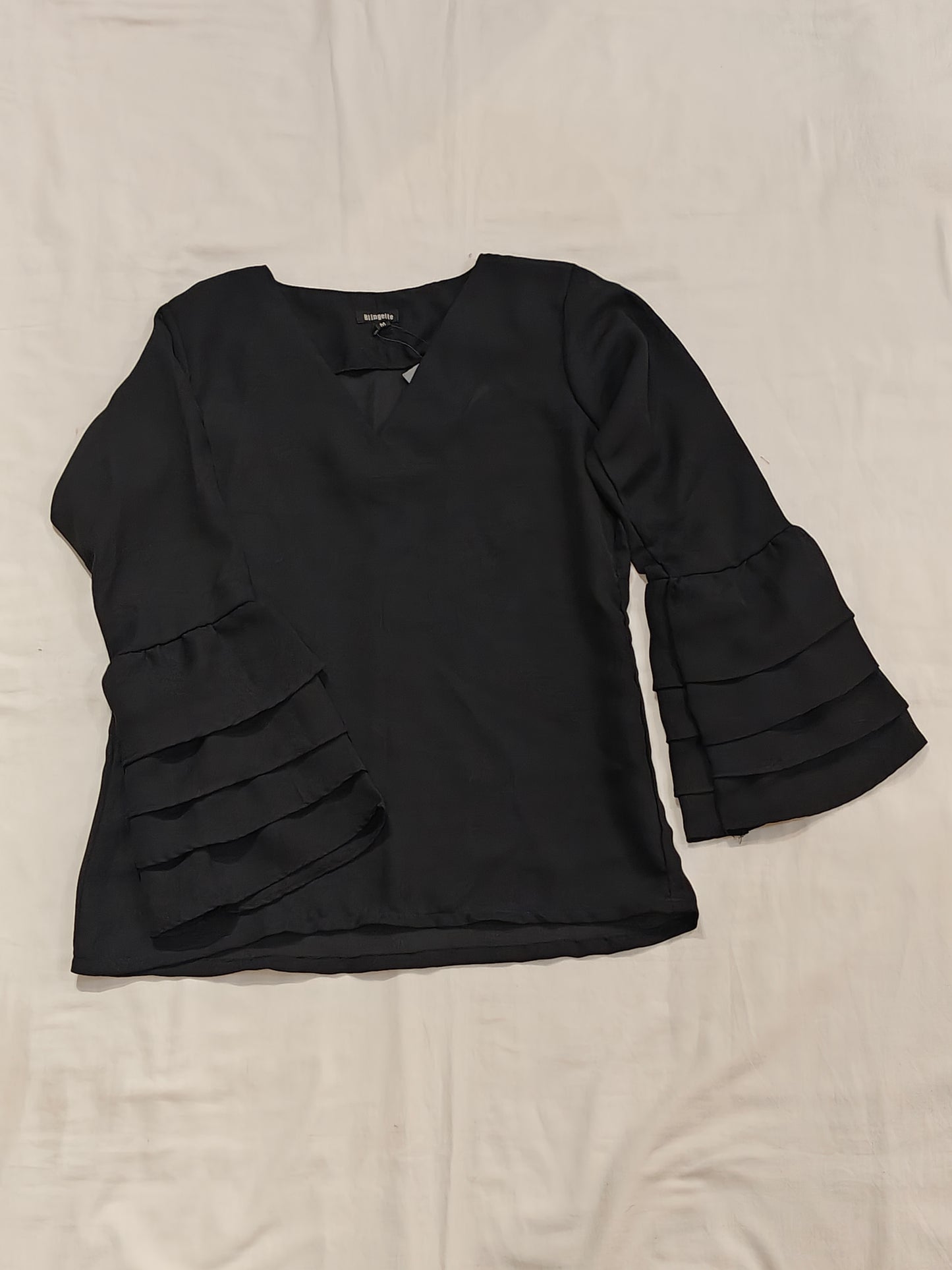 Black ruffled sleeves v-neck top