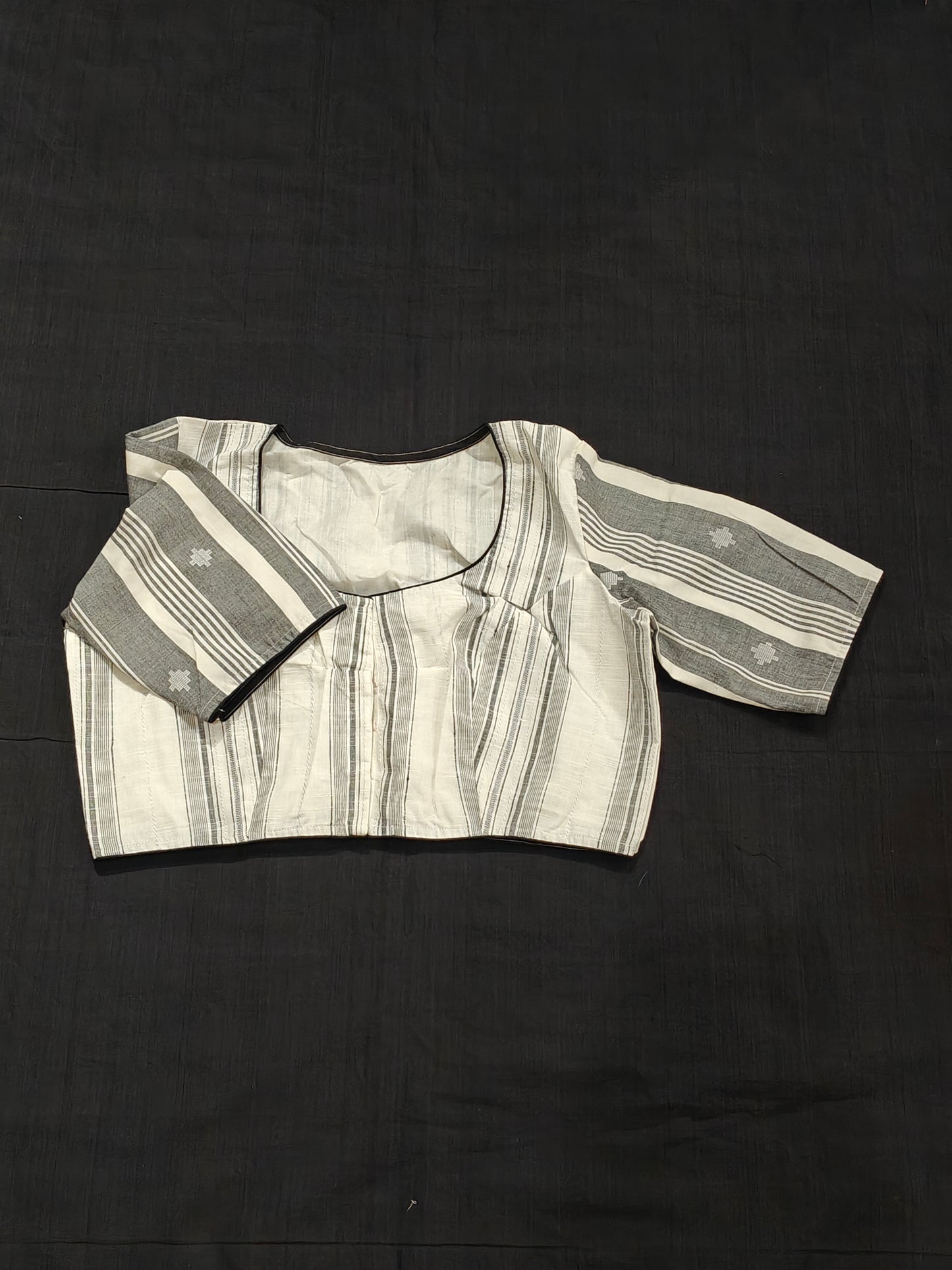 White and grey jamdani handloom cotton blouse with floral embroidered back